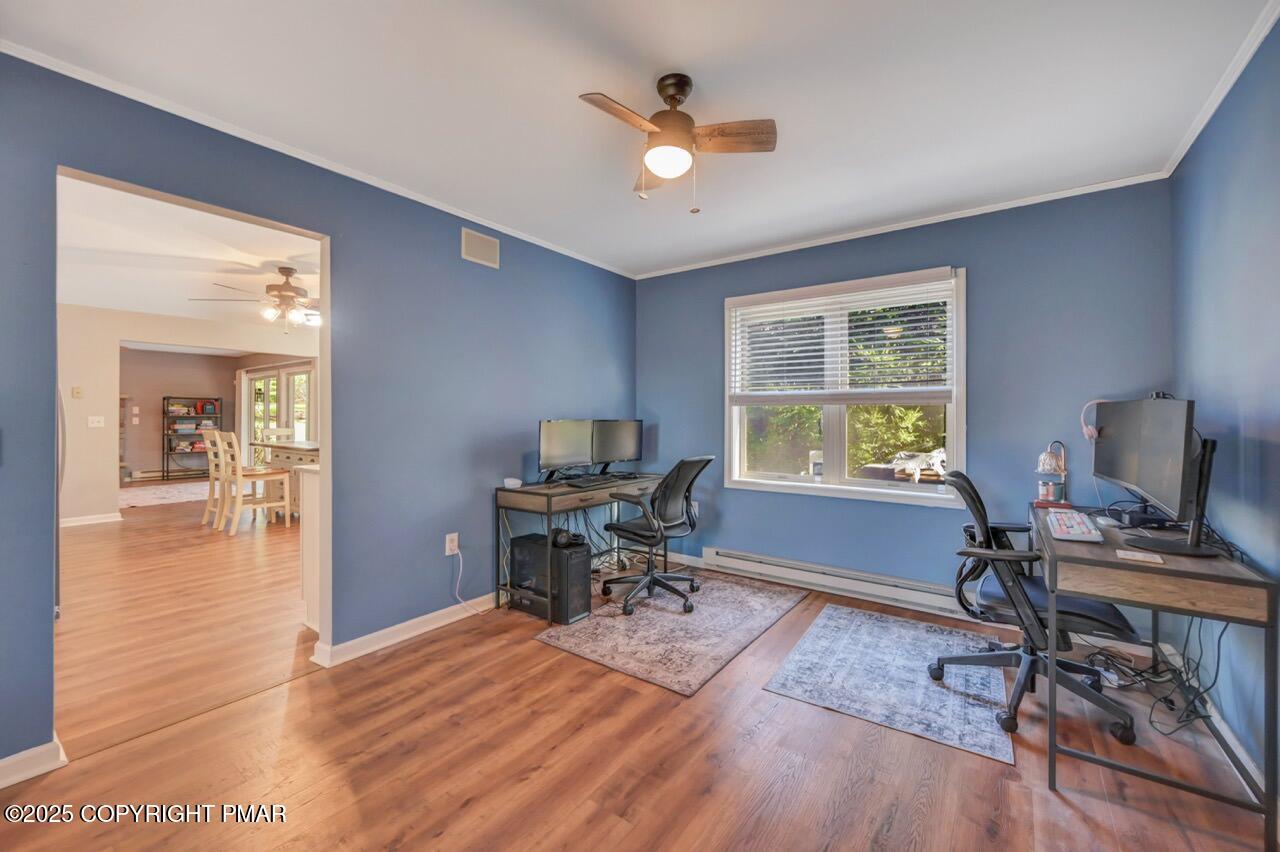 12 Kent Clarke Road Lake Harmony, PA 18624 - Photo 11 of 42 a workspace with furniture hardwood and a window