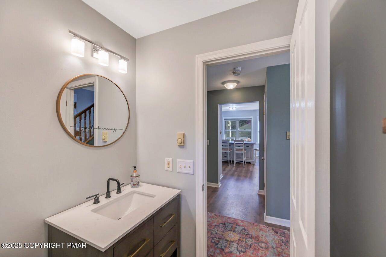 12 Kent Clarke Road Lake Harmony, PA 18624 - Photo 25 of 42 a bathroom with a sink and a mirror