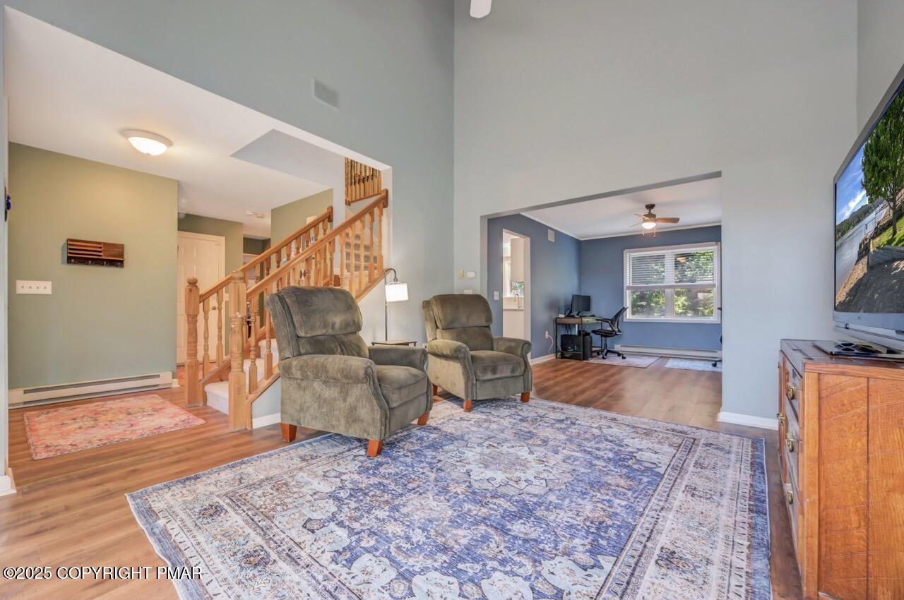 12 Kent Clarke Road Lake Harmony, PA 18624 - Photo 8 of 42 a living room with furniture and a wooden floor