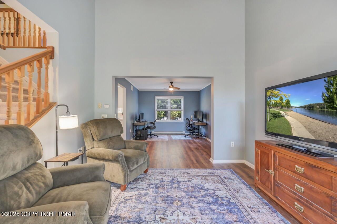 12 Kent Clarke Road Lake Harmony, PA 18624 - Photo 9 of 42 a living room with furniture and a flat screen tv
