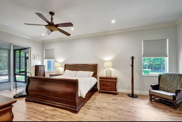 a bedroom with a bed and a couch