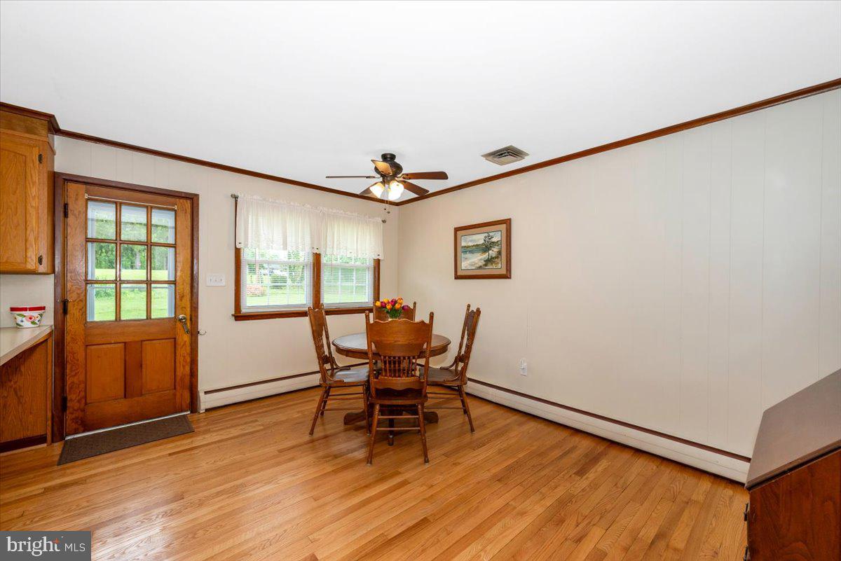22019 Mohawk Drive Smithsburg, MD 21783 - Photo 19 of 60 a view of a livingroom with furniture and wooden floor