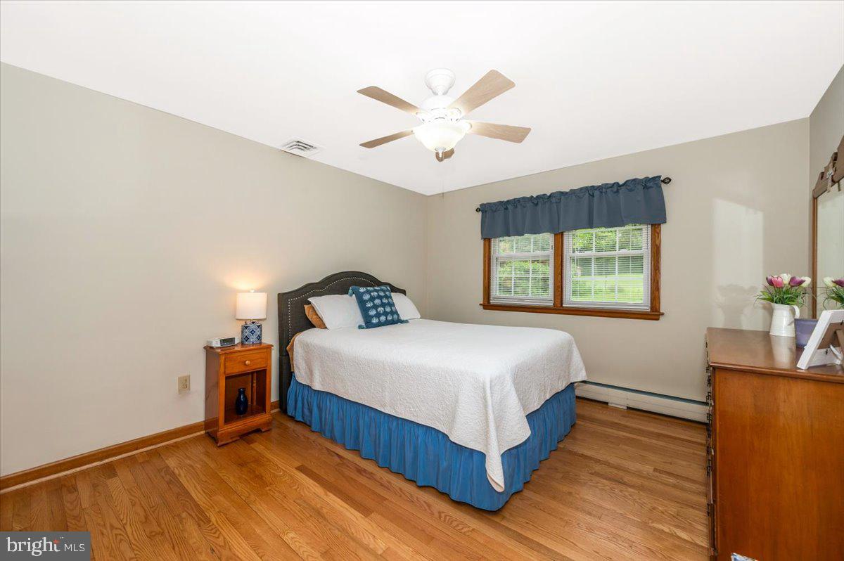22019 Mohawk Drive Smithsburg, MD 21783 - Photo 25 of 60 a bedroom with a bed and window
