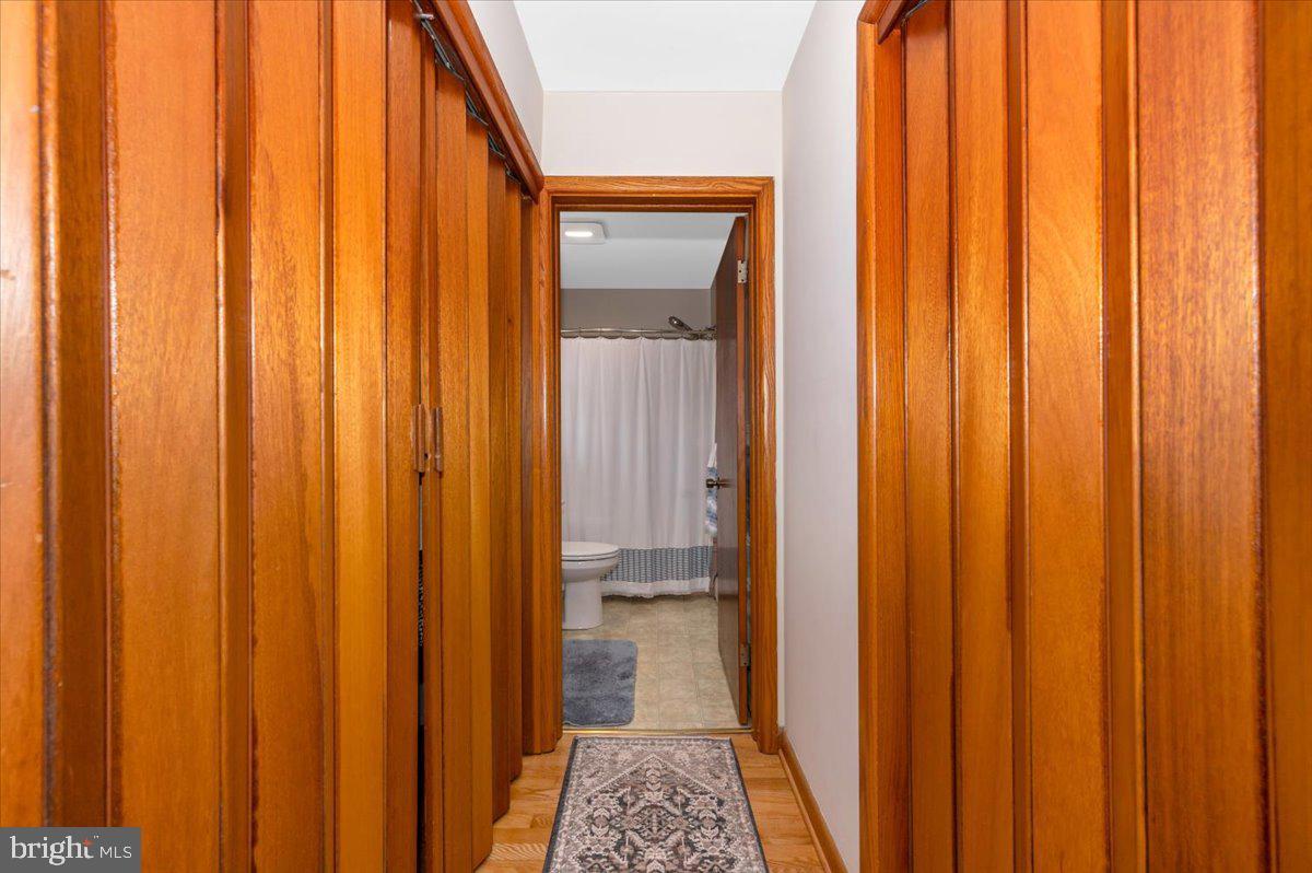 22019 Mohawk Drive Smithsburg, MD 21783 - Photo 27 of 60 a view of a bathroom with shower curtain