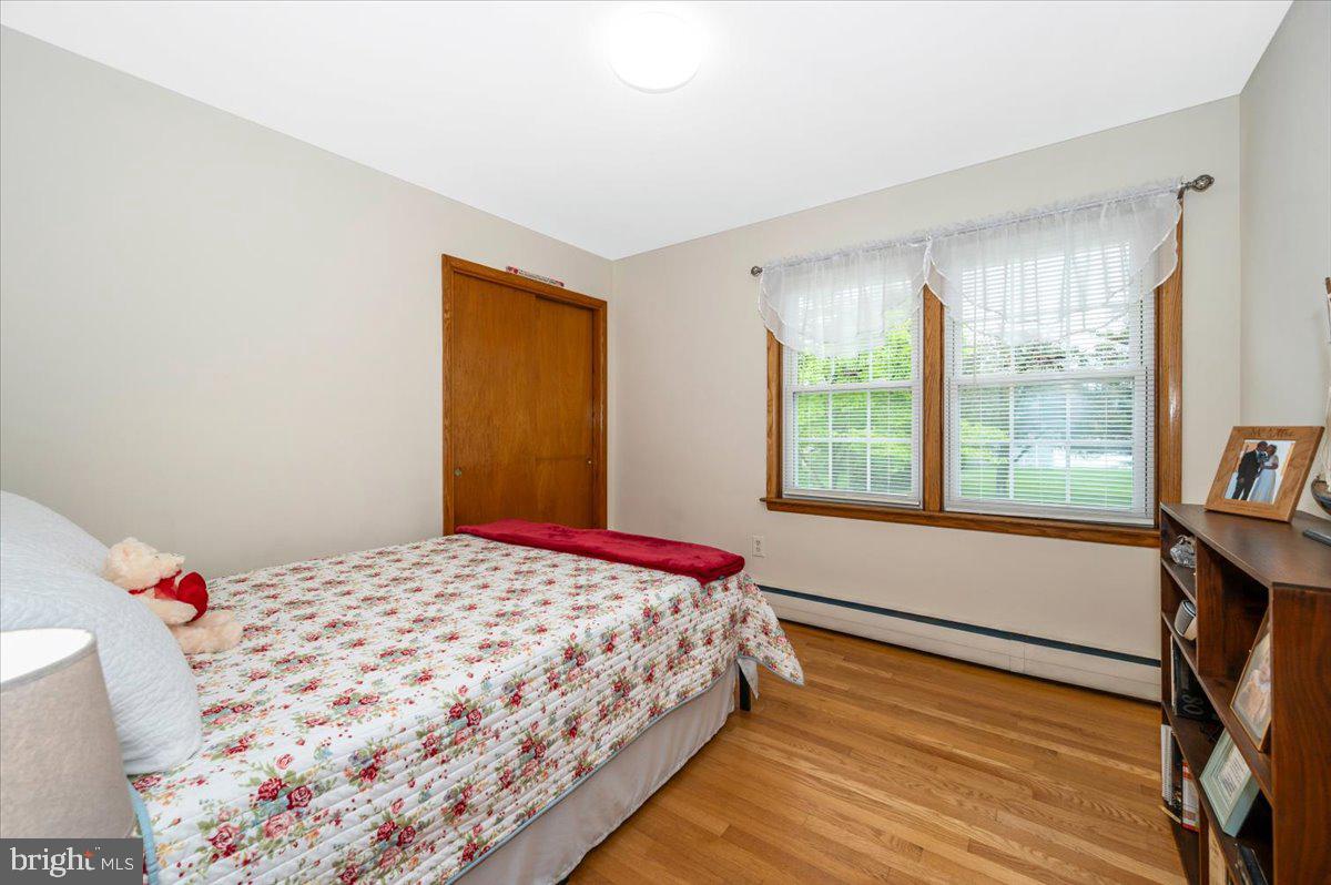 22019 Mohawk Drive Smithsburg, MD 21783 - Photo 29 of 60 a bedroom with a bed and a window