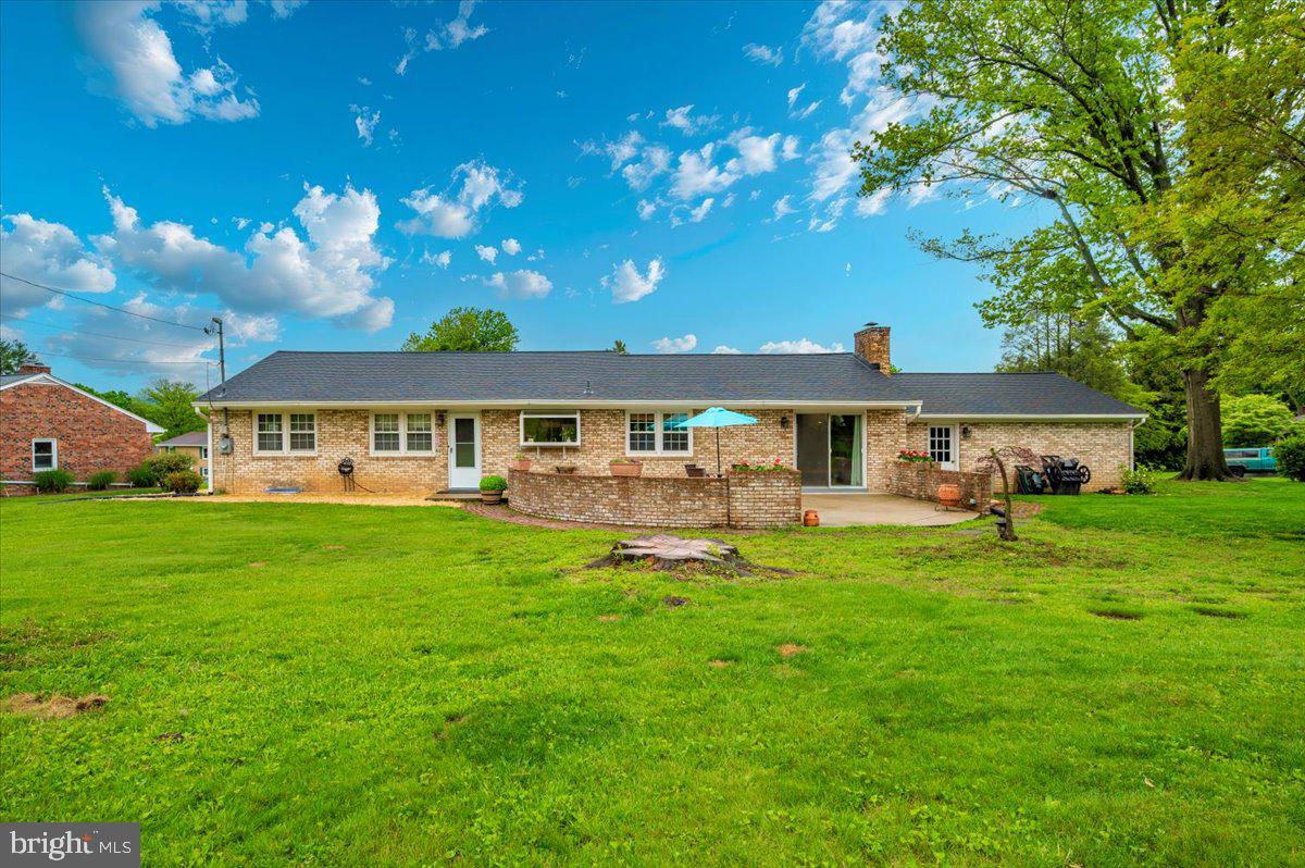 22019 Mohawk Drive Smithsburg, MD 21783 - Photo 46 of 60 a front view of a house with a garden