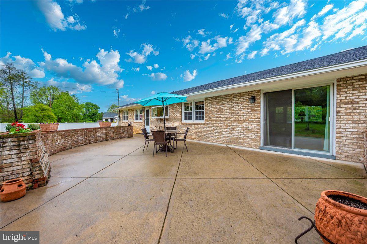 22019 Mohawk Drive Smithsburg, MD 21783 - Photo 48 of 60 a view of a patio with table and chairs and potted plants