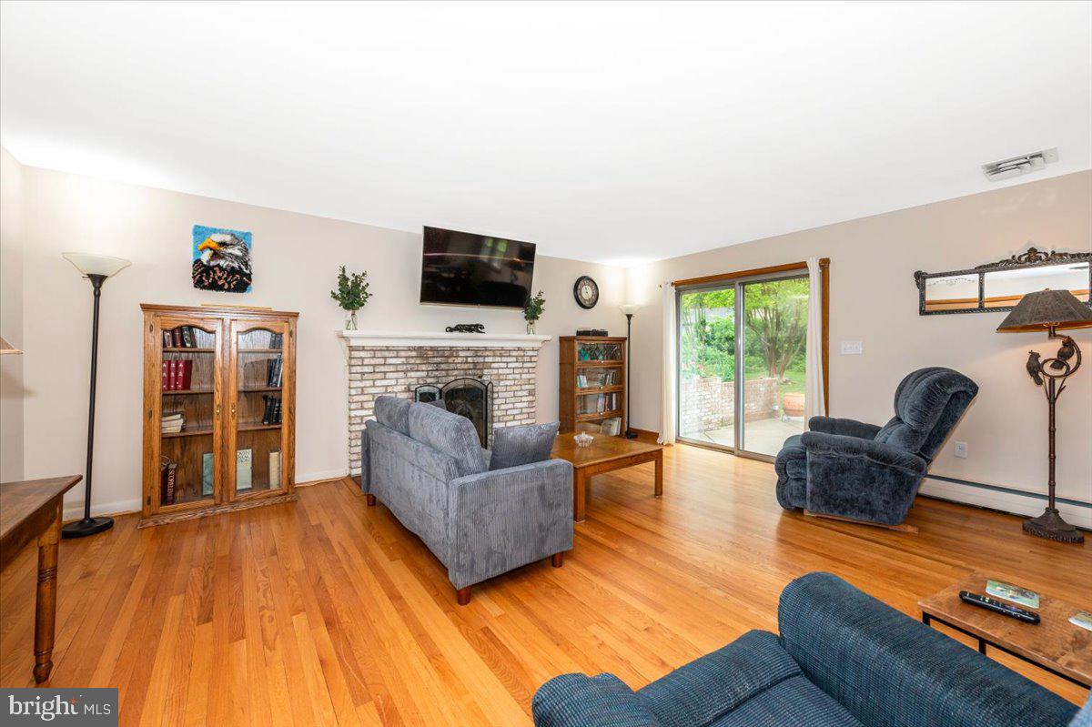 22019 Mohawk Drive Smithsburg, MD 21783 - Photo 5 of 60 a living room with furniture and a flat screen tv