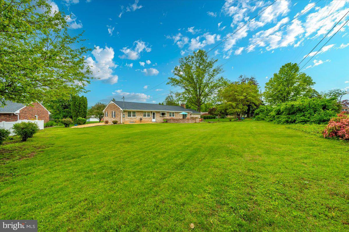 22019 Mohawk Drive Smithsburg, MD 21783 - Photo 52 of 60 a view of an house with backyard space and garden