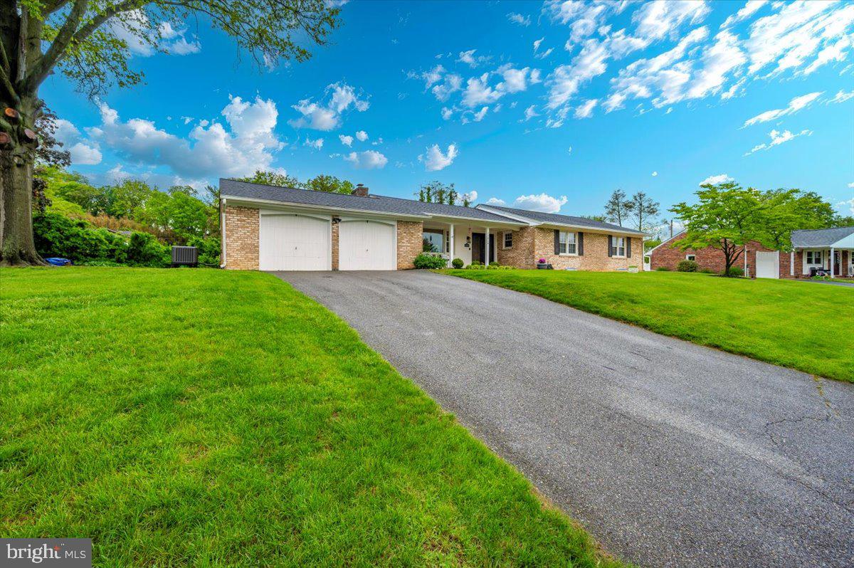 22019 Mohawk Drive Smithsburg, MD 21783 - Photo 60 of 60 a view of a house next to a yard with plants and trees