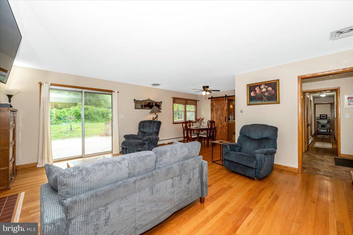 22019 Mohawk Drive Smithsburg, MD 21783 - Photo 6 of 60 a living room with furniture and a large window