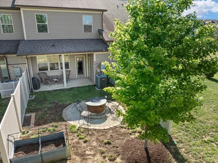 an aerial view of a house with a garden