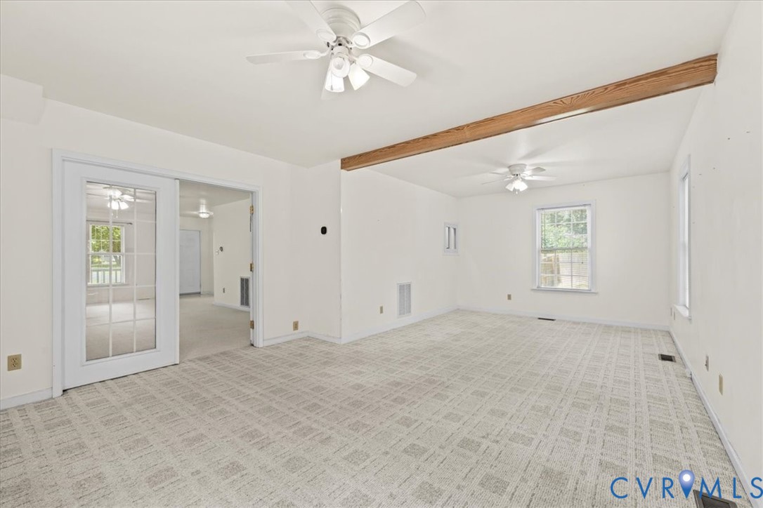 2924 Warfield Ridge Terrace Chester, VA 23831 - Photo 16 of 38 Spacious interior with neutral patterned carpeting