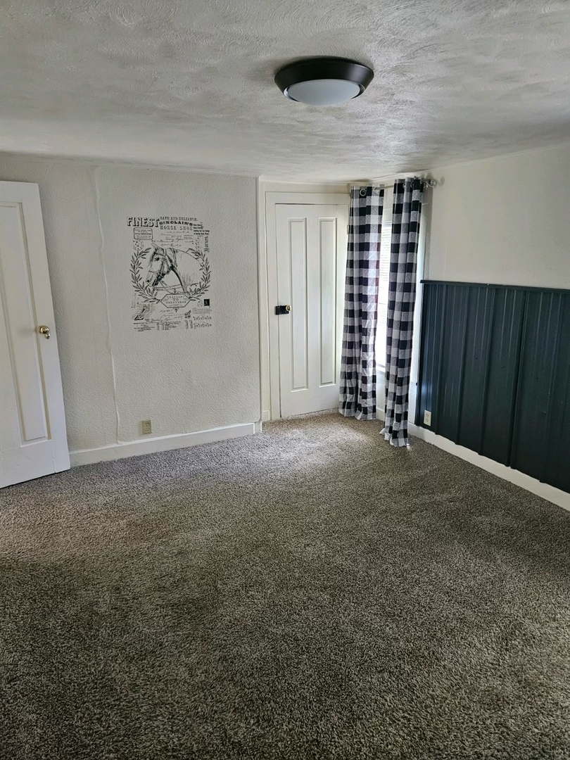 416 Madison Avenue Dixon, IL 61021 - Photo 11 of 34 a view of an empty room with a window
