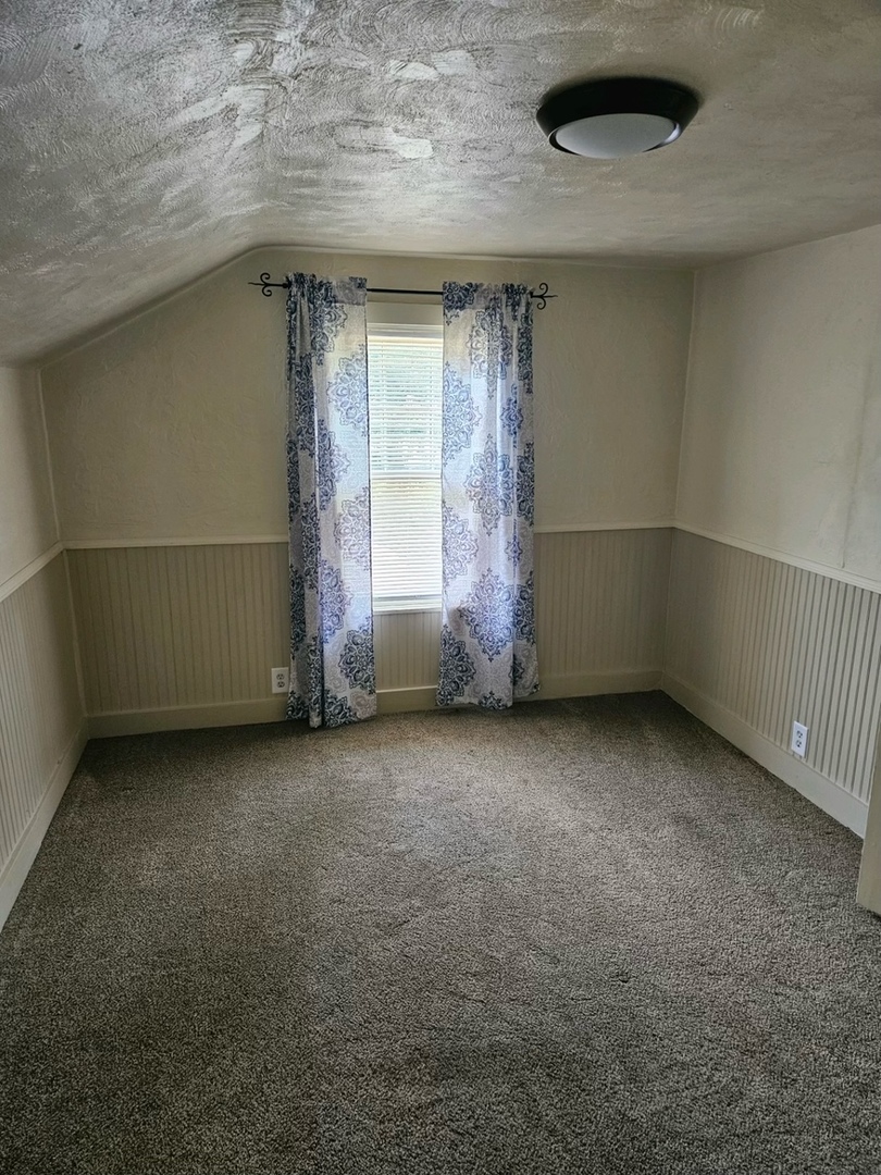 416 Madison Avenue Dixon, IL 61021 - Photo 15 of 34 an empty room with windows