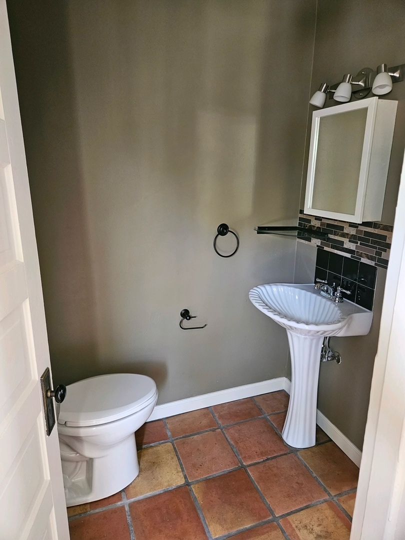 416 Madison Avenue Dixon, IL 61021 - Photo 17 of 34 a bathroom with a toilet and a sink