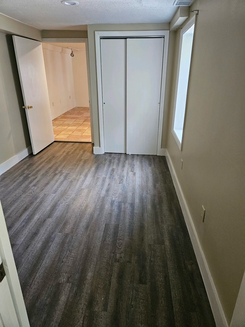 416 Madison Avenue Dixon, IL 61021 - Photo 27 of 34 a view of hallway with wooden floor