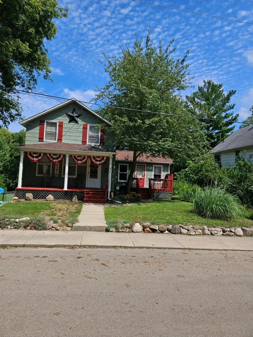 416 Madison Avenue Dixon, IL 61021 - Photo 28 of 34 a front view of a house with a garden