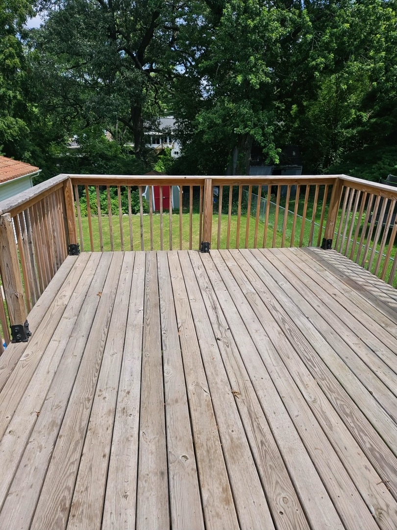 416 Madison Avenue Dixon, IL 61021 - Photo 30 of 34 a view of deck with wooden floor and fence