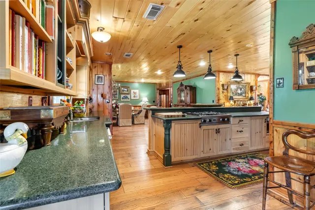 an entryway with furniture and a rug
