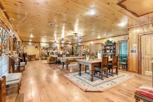 a view of a patio table and chairs