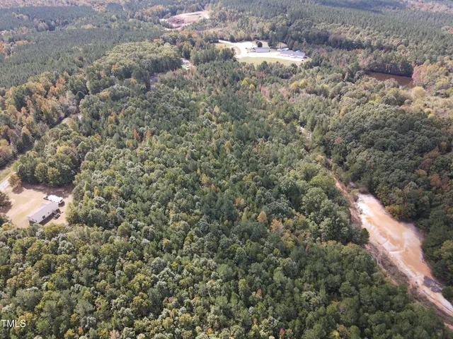 a view of a forest from a balcony
