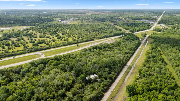 a view of swimming pool from a balcony