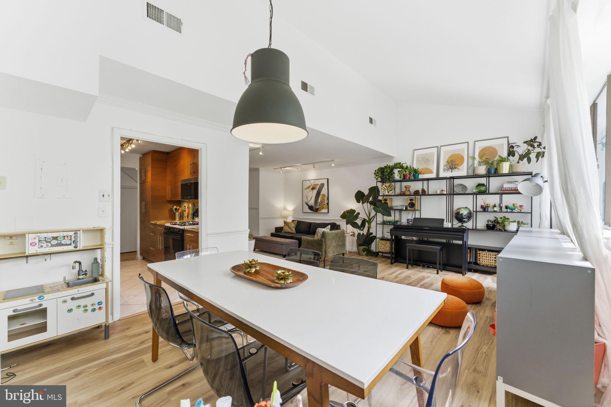 11260 Chestnut Grove Square, Unit 337 Reston, VA 20190 - Photo 16 of 82 Bright and airy modern living space.
