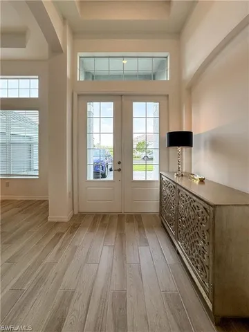 wooden floor with a window in a room