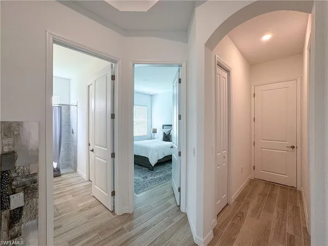 a view of a livingroom from a hallway