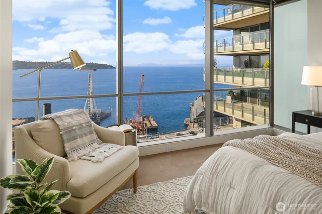 a bedroom with furniture and a window