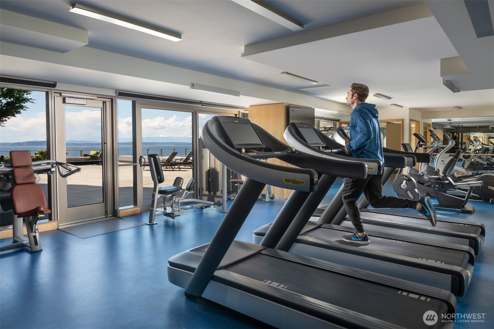 99 Union Street, Unit 1401 Seattle, WA 98101 - Photo 15 of 17 a view of a room with gym equipment