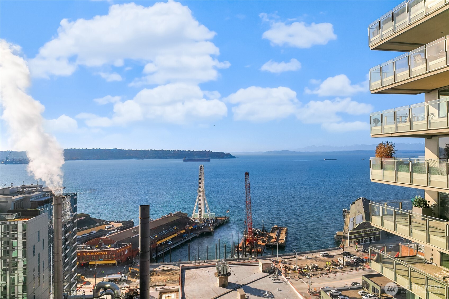 99 Union Street, Unit 1401 Seattle, WA 98101 - Photo 3 of 11 a view of a terrace with seating area