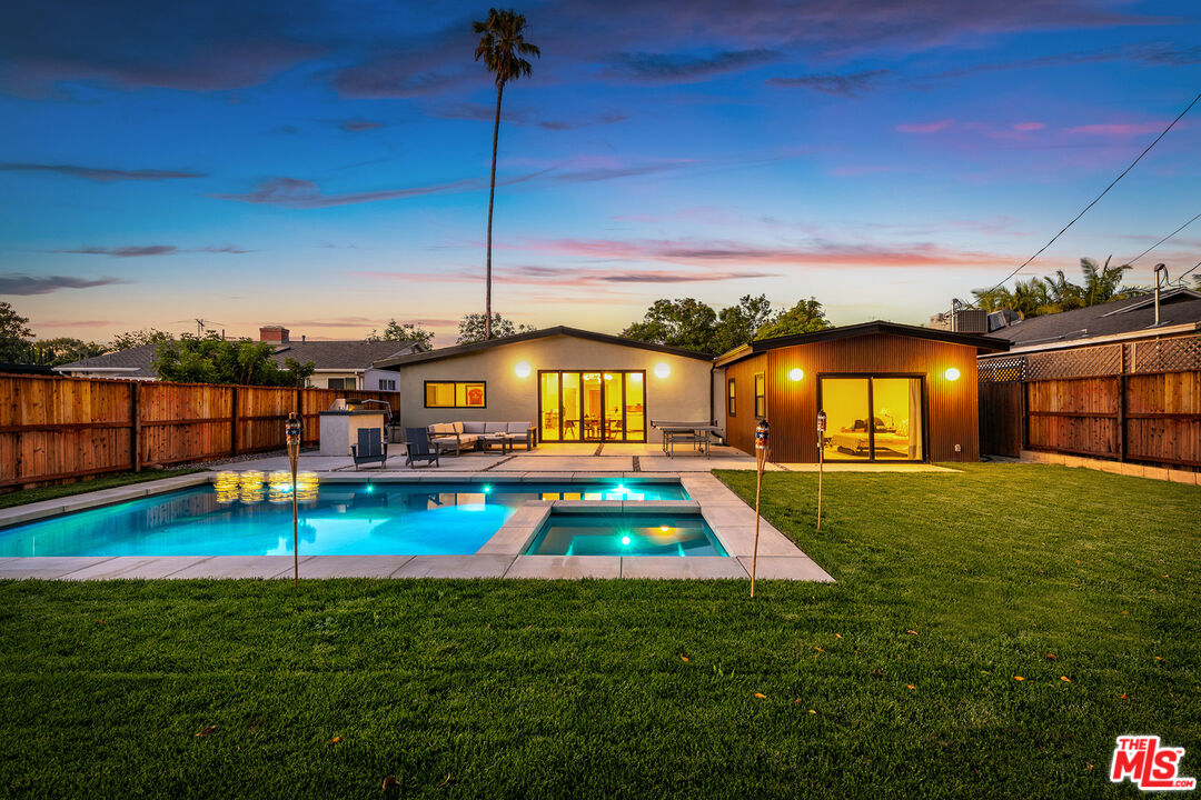 a view of a house with a swimming pool