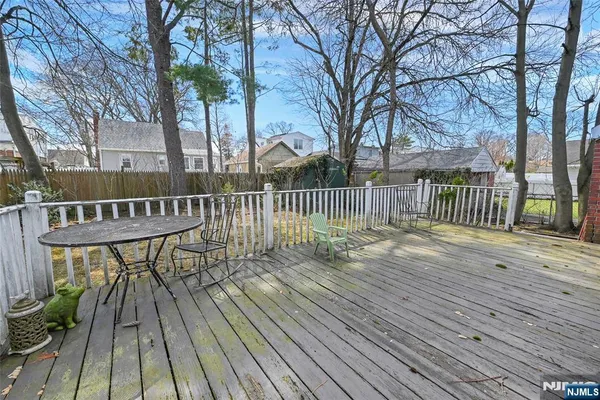 a view of a wooden deck with a patio