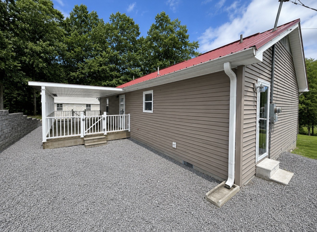 153 Henry Harris Road Westmoreland, TN 37186 - Photo 3 of 18 a backyard of a house