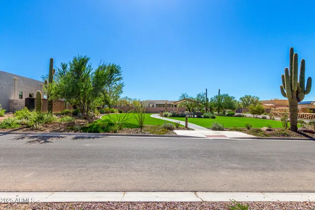a view of a road with a building in the background