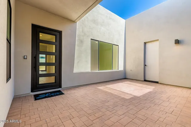 an empty room with windows