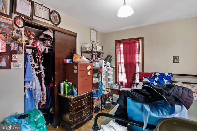 a kitchen with stainless steel appliances a refrigerator sink and cabinets