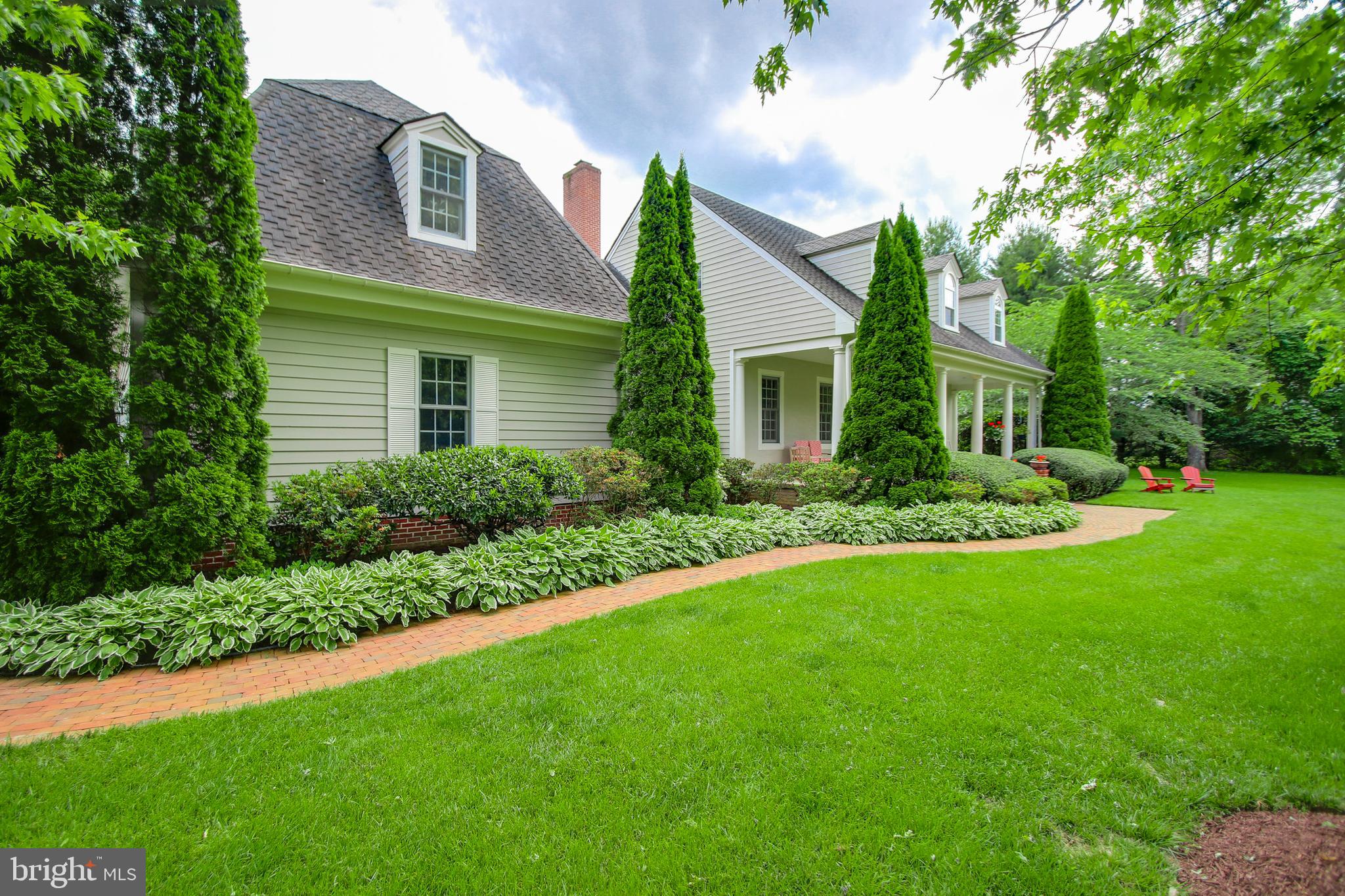 6504 Griffith Road Gaithersburg, MD 20882 - Photo 69 of 73 Winding brick walkway and lovely landscpaing