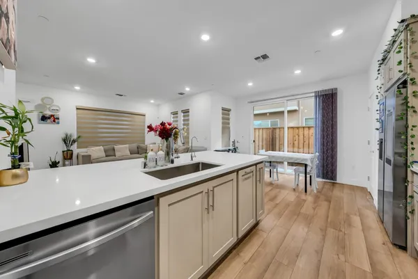 a kitchen with sink and window