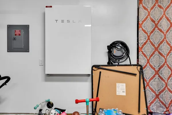 a view of storage and utility room with washer and dryer