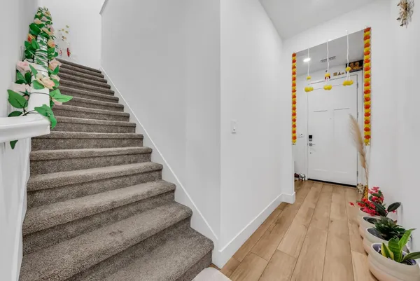 a view of entryway with stairs