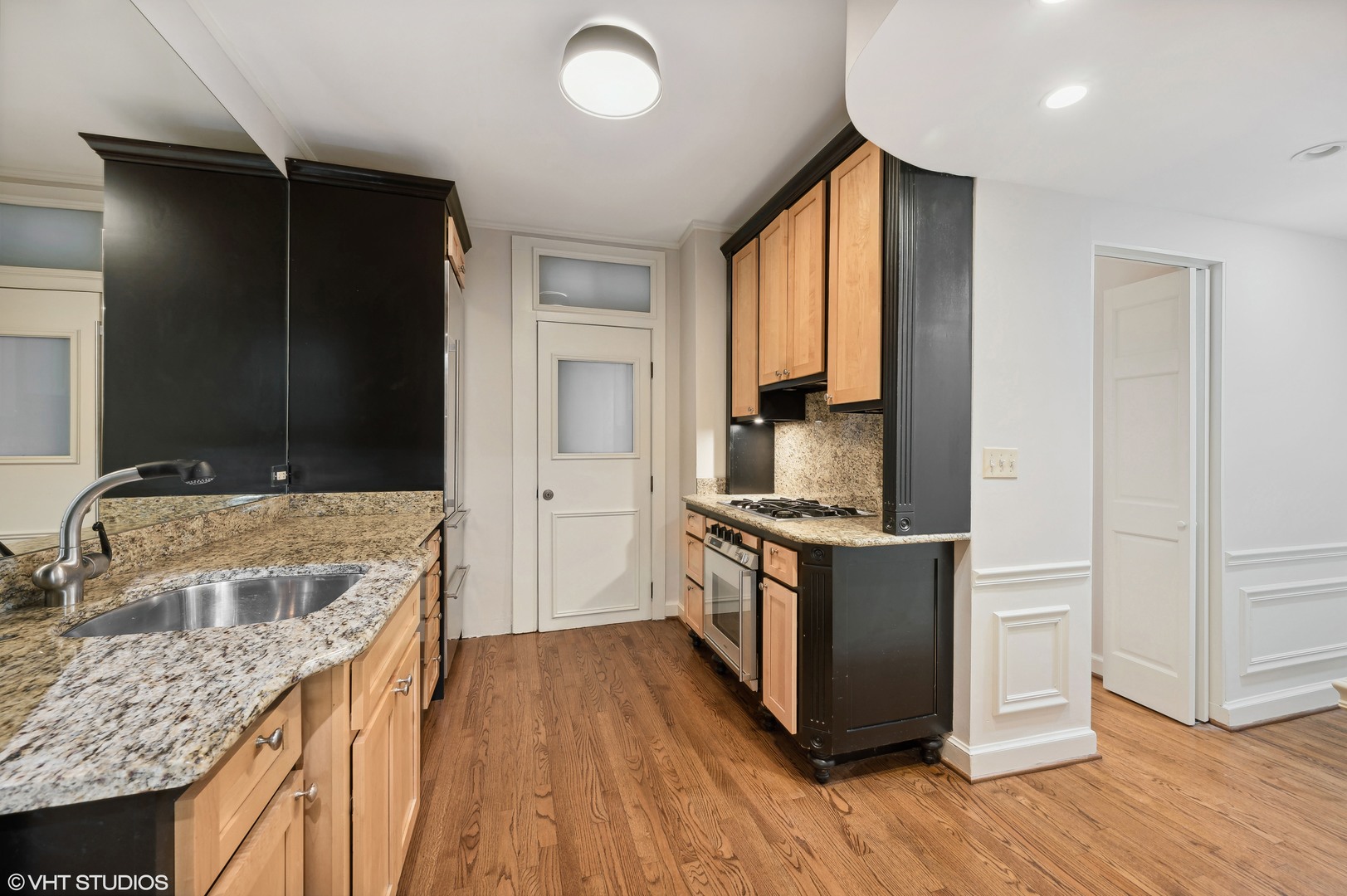 3100 North Sheridan Road, Unit 4D Chicago, IL 60657 - Photo 16 of 21 a kitchen with a stove and a sink