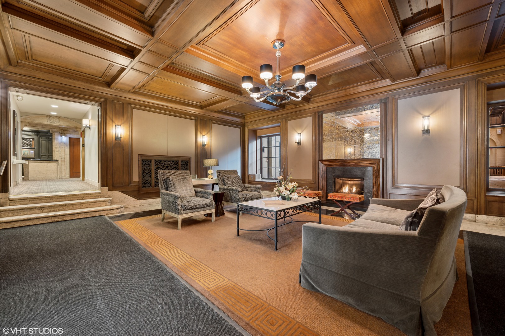 3100 North Sheridan Road, Unit 4D Chicago, IL 60657 - Photo 3 of 21 a living room with furniture a chandelier and a large window