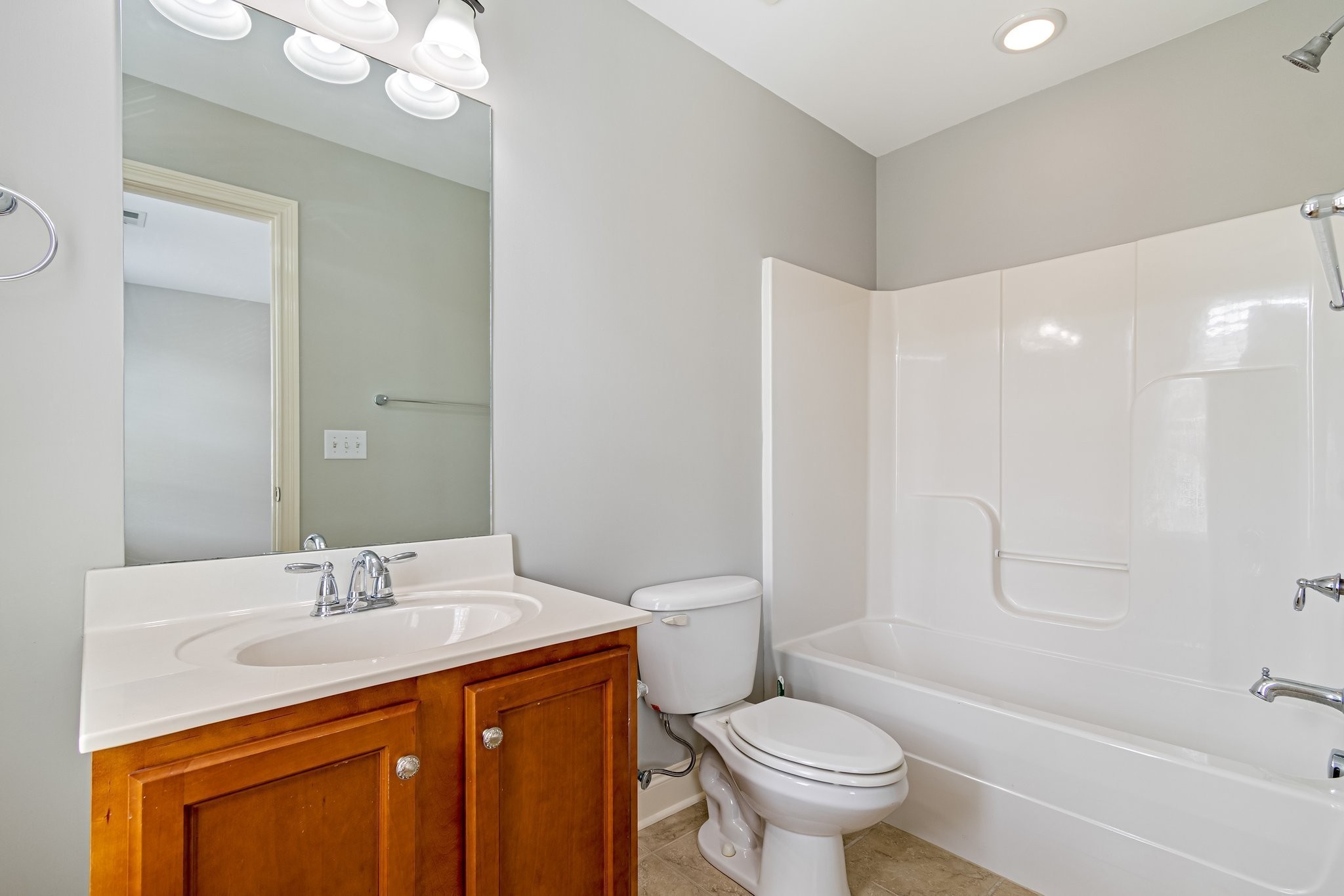 318 Byron Way Franklin, TN 37064 - Photo 30 of 53 a bathroom with a granite countertop sink a toilet and a mirror