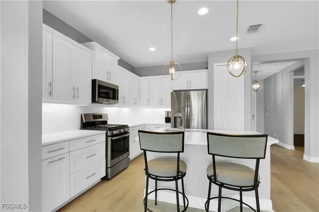 a aerial view of a house with garden space and street view