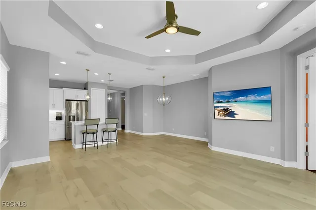 a bathroom with a sink and a large mirror