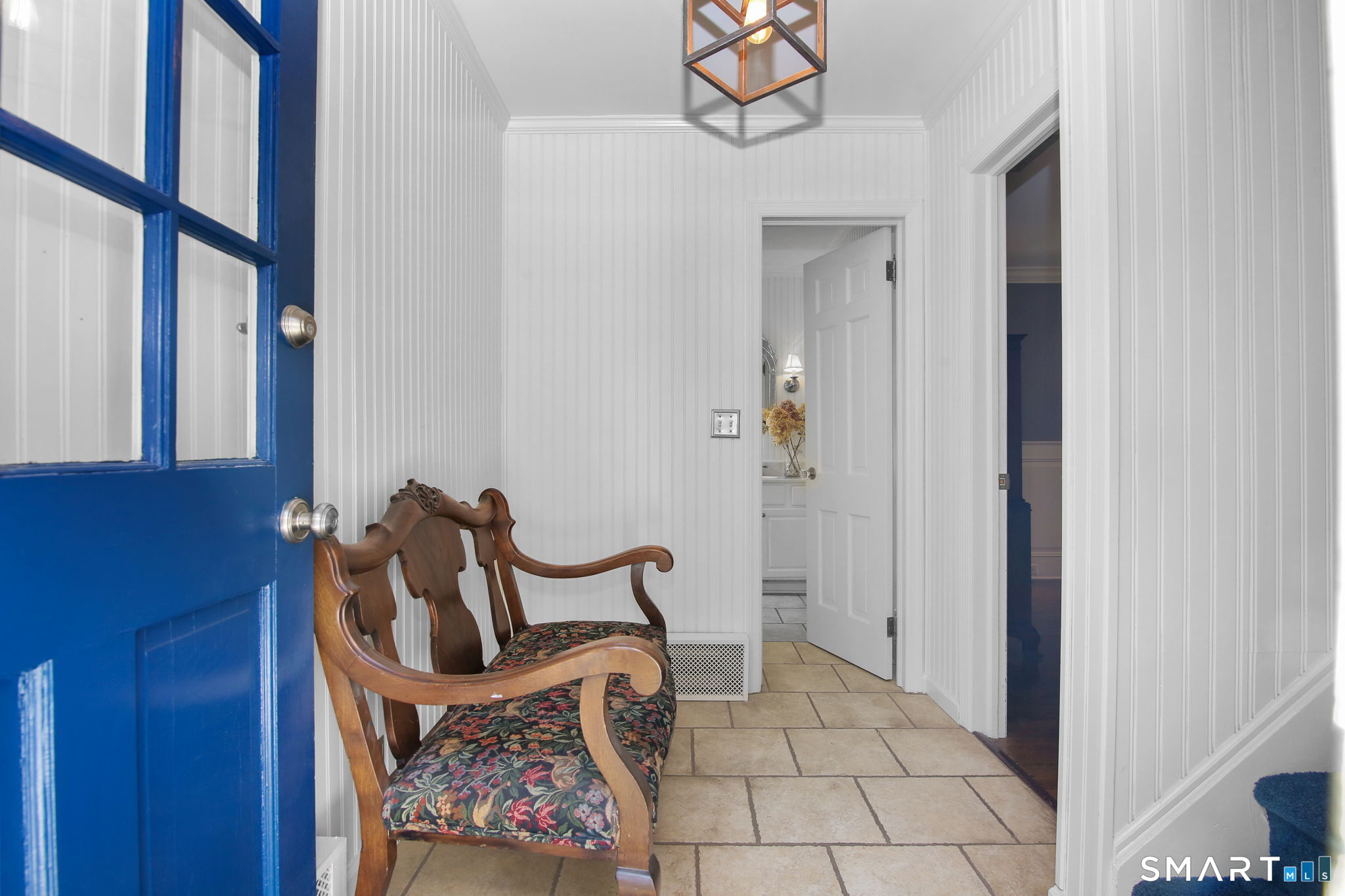 63 Pipers Hill Road Wilton, CT 06897 - Photo 18 of 37 a view of a hallway with seating area