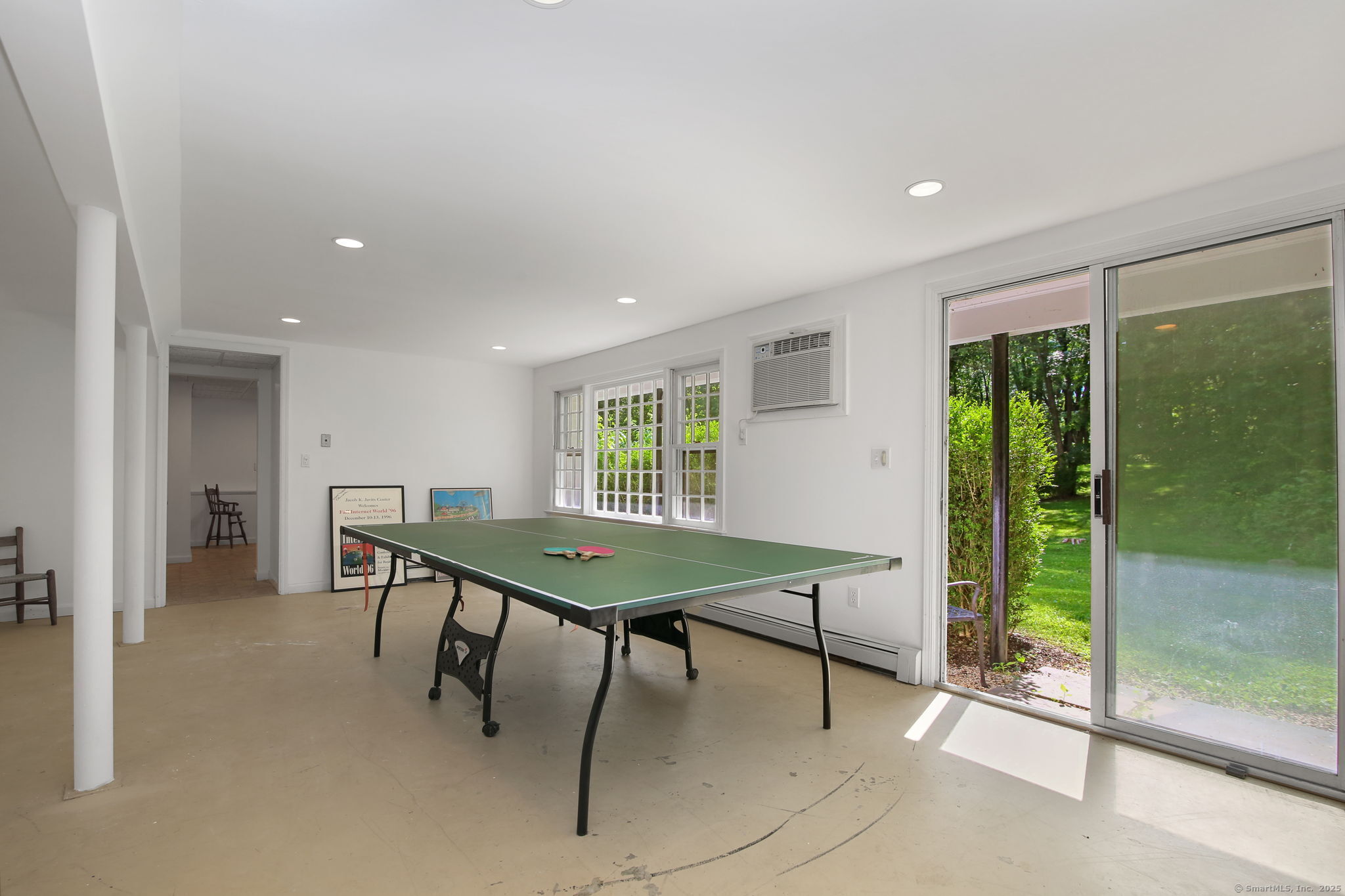 63 Pipers Hill Road Wilton, CT 06897 - Photo 27 of 37 a room with furniture pool table and glass door